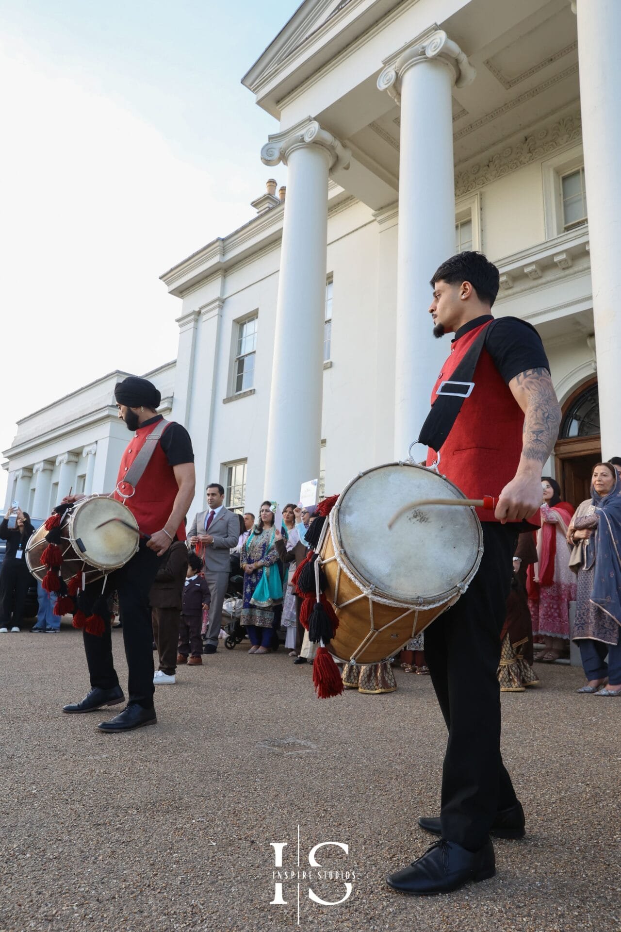 Dhol players performing during a wedding at Hylands House, Chelmsford.