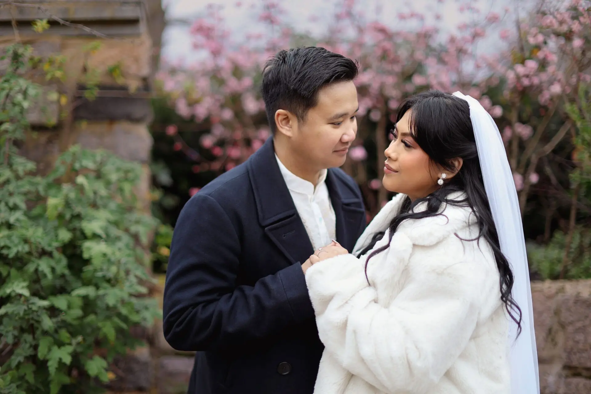 Filipino bride and groom during an outdoor wedding photography session by Inspire Studios in Danson Park.