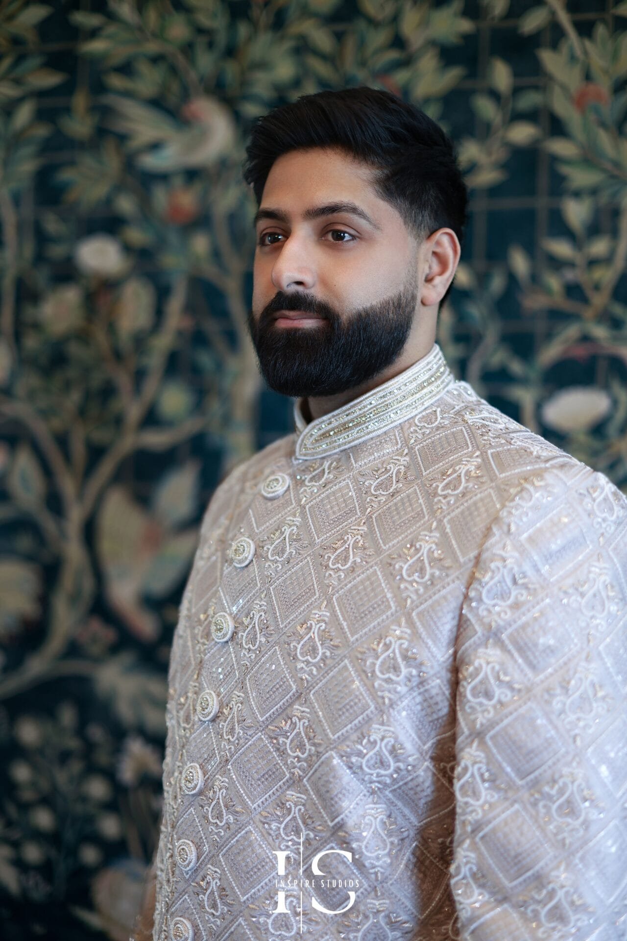 Close-up wedding portrait of the groom at Hylands House, Chelmsford.