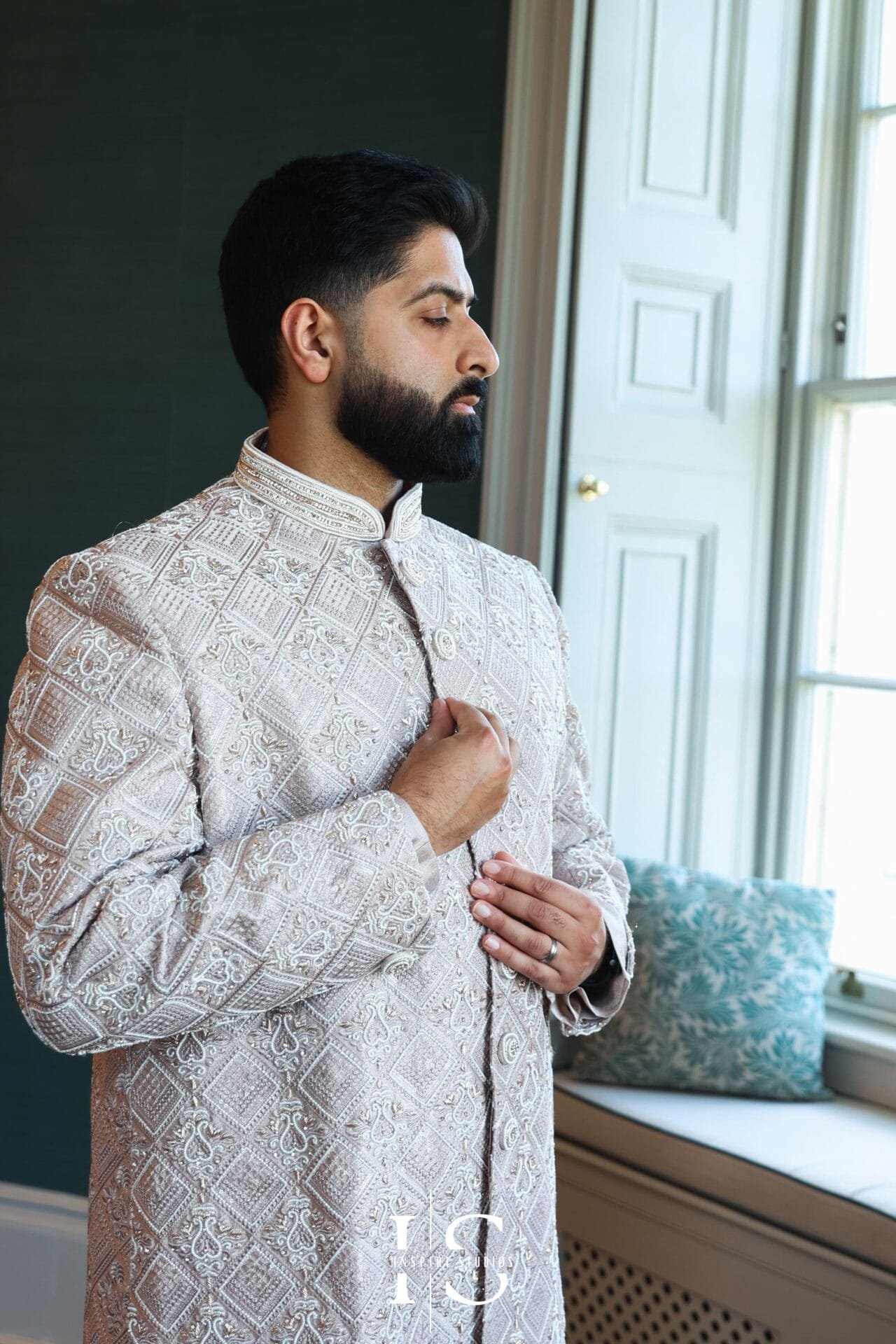 Groom in Pakistani wedding attire photographed at Hylands House, Chelmsford.