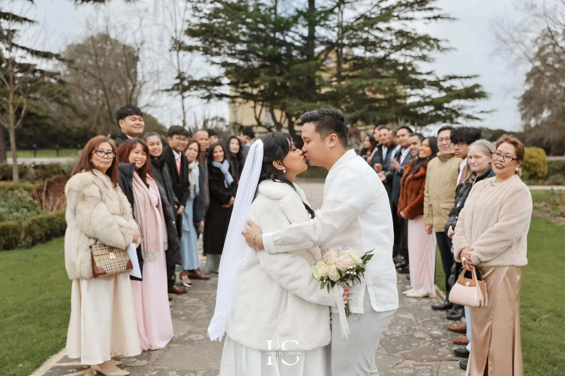 Filipino newlywed couple photographed by Inspire Studios during an outdoor photoshoot at Danson Park, Bexley.