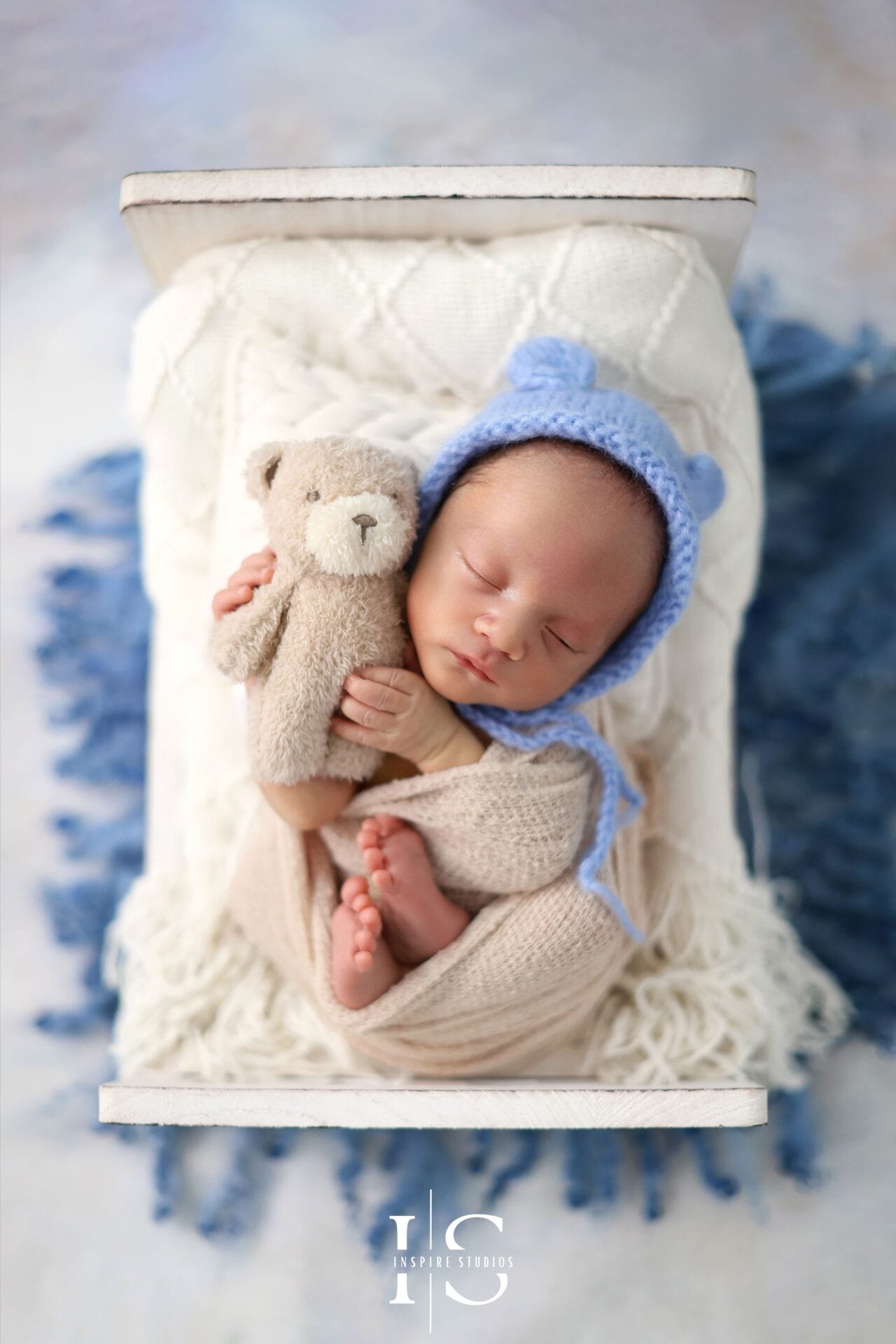 Newborn photoshoot at Inspire Studios in London with 2026 bookings open for baby studio portraits.
