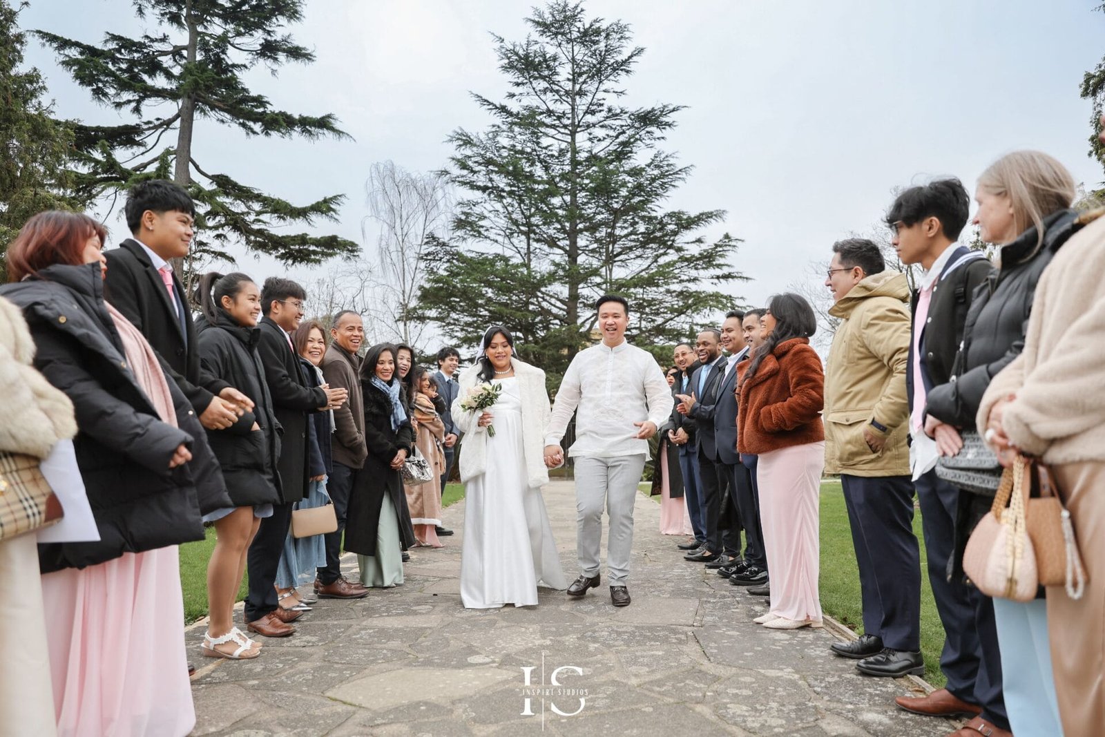 Outdoor wedding photography of a Filipino newlywed couple surrounded by the natural scenery of Danson Park in Bexley.