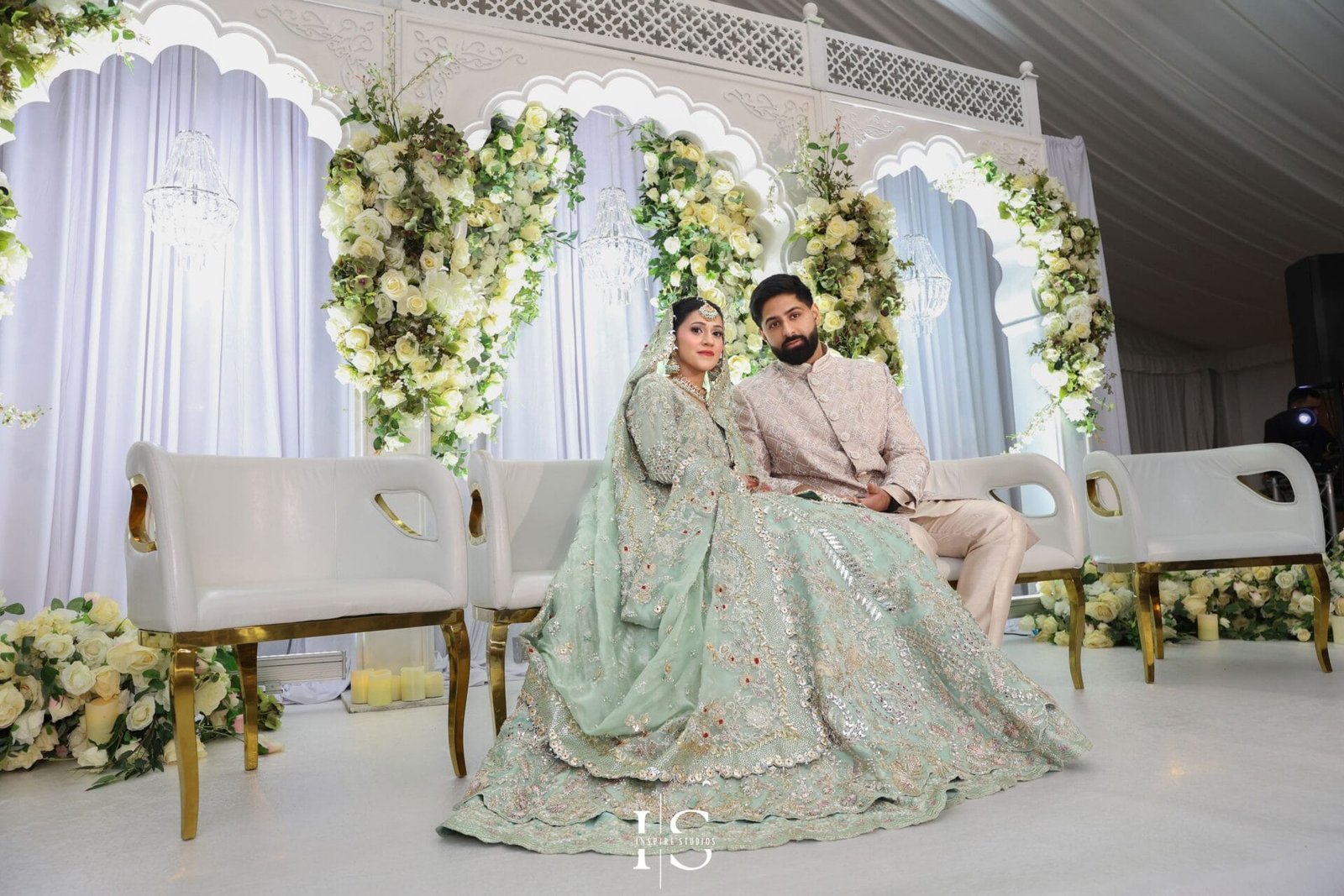 Decorated Pakistani bridal stage at a Hylands House wedding in Chelmsford.