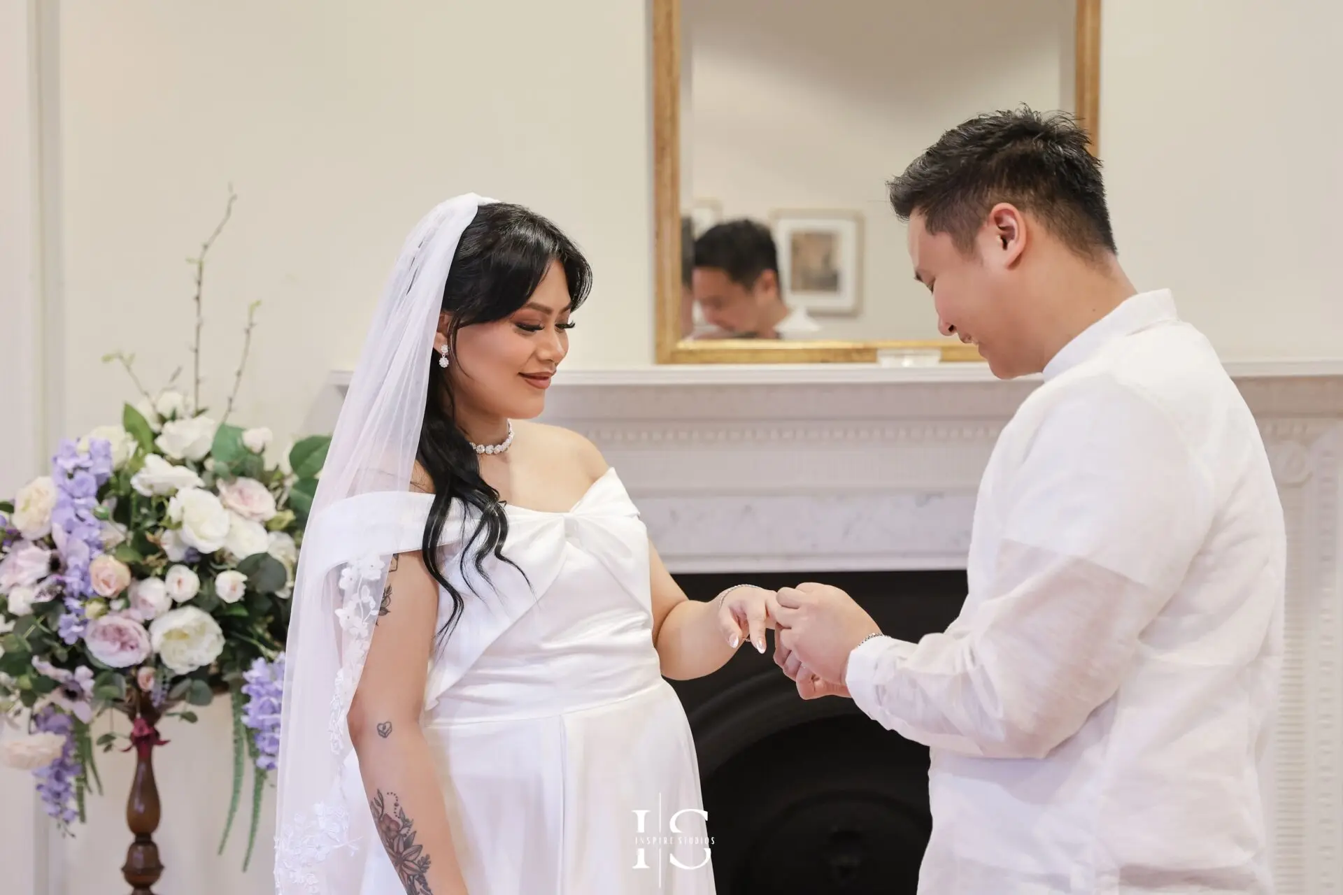 Filipino bride and groom photographed during their civil wedding at Danson House registry venue in Bexley, London.