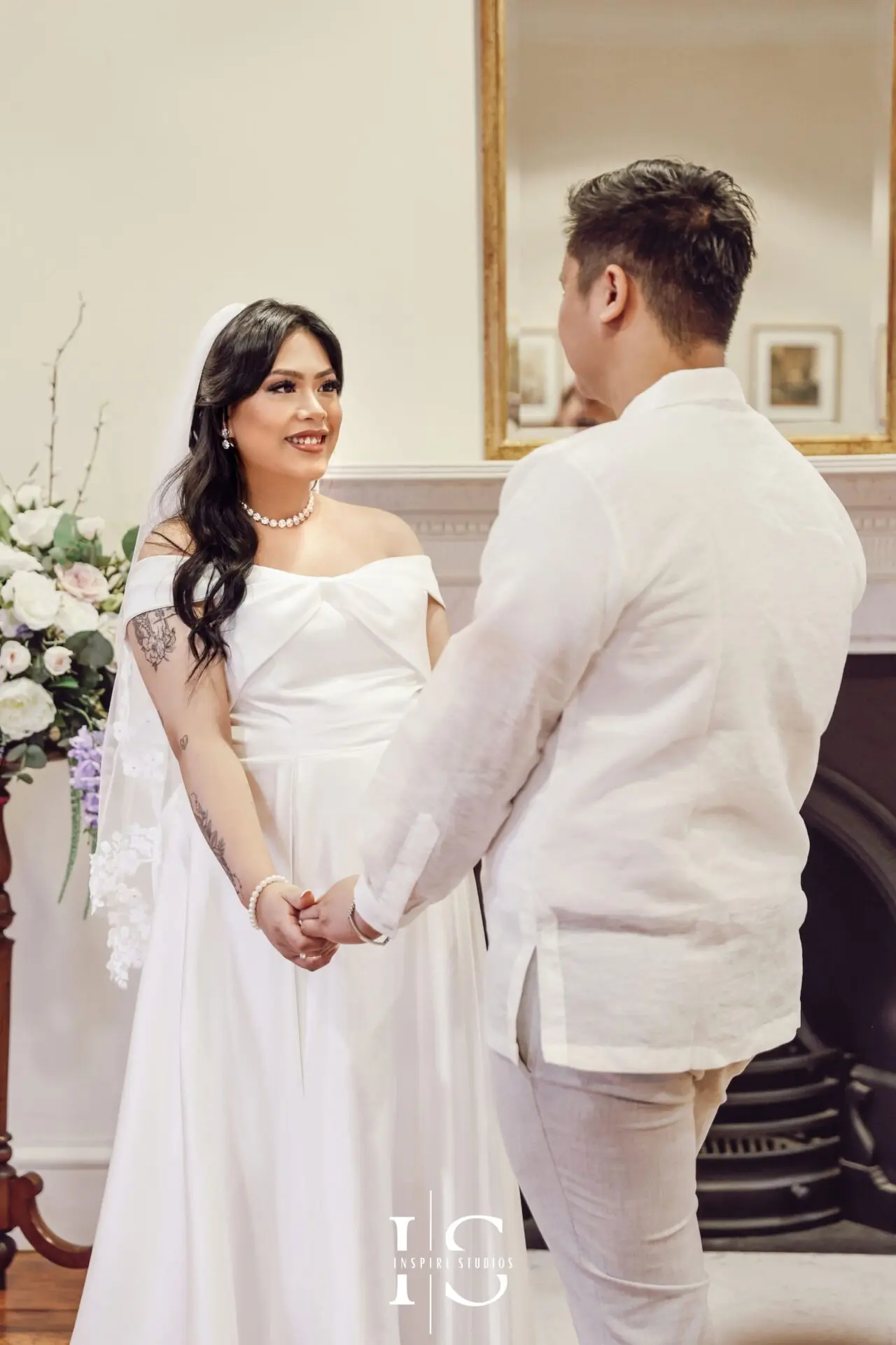 Registry office wedding photography of a bride and groom during their civil ceremony in Bexley.