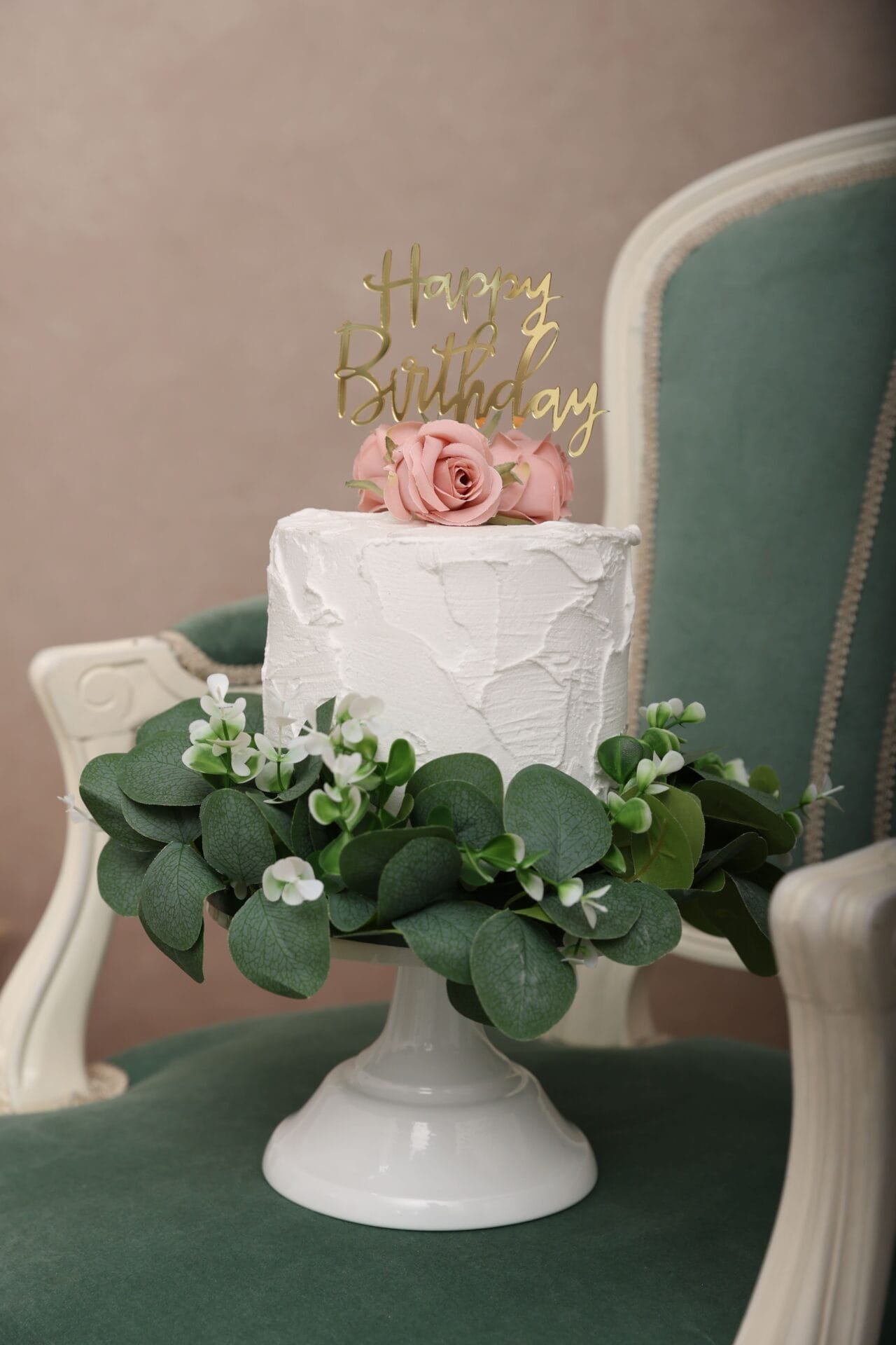 Senior birthday photoshoot dummy cake setup in London studio