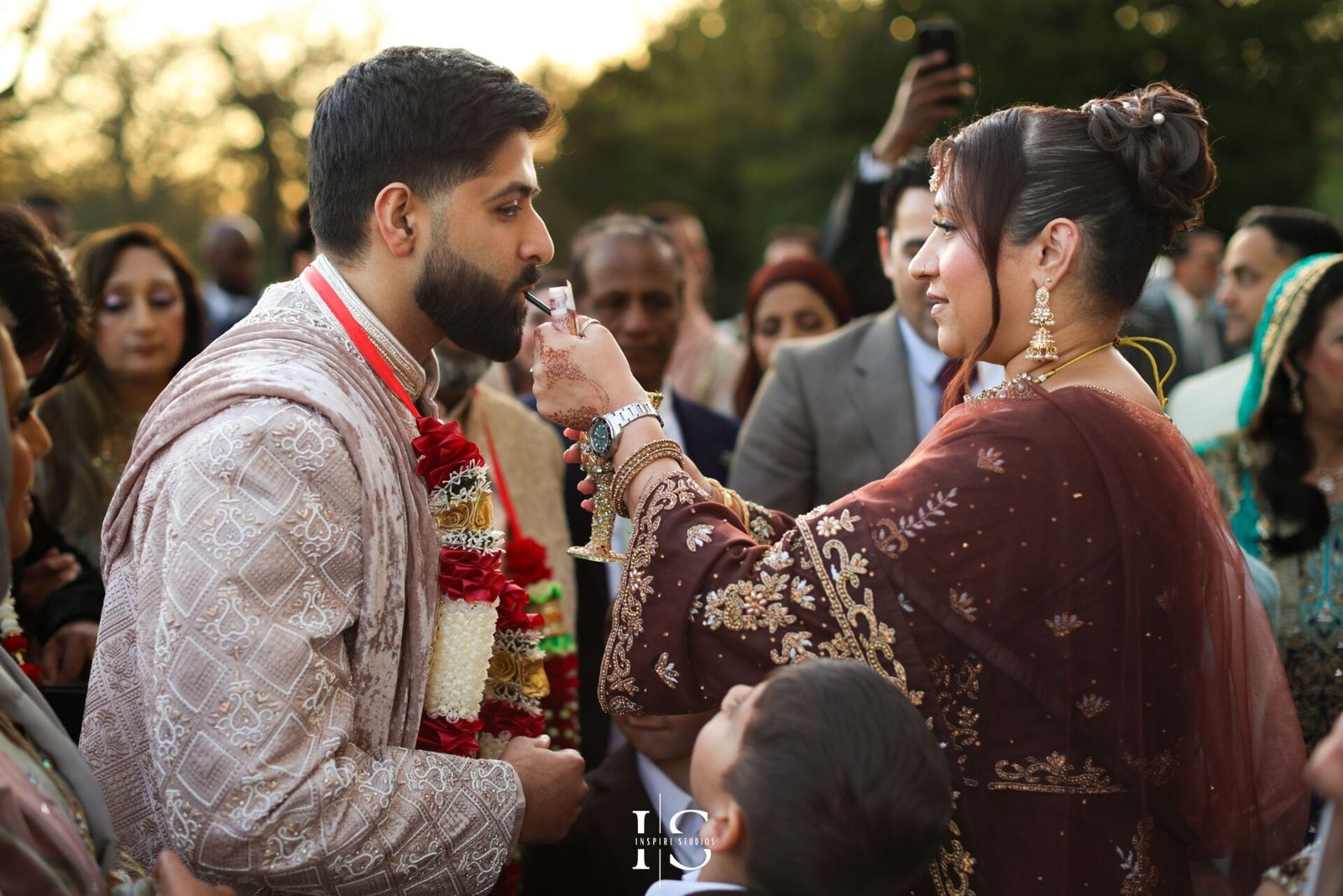 Traditional Pakistani wedding celebration inside Hylands House, Chelmsford.
