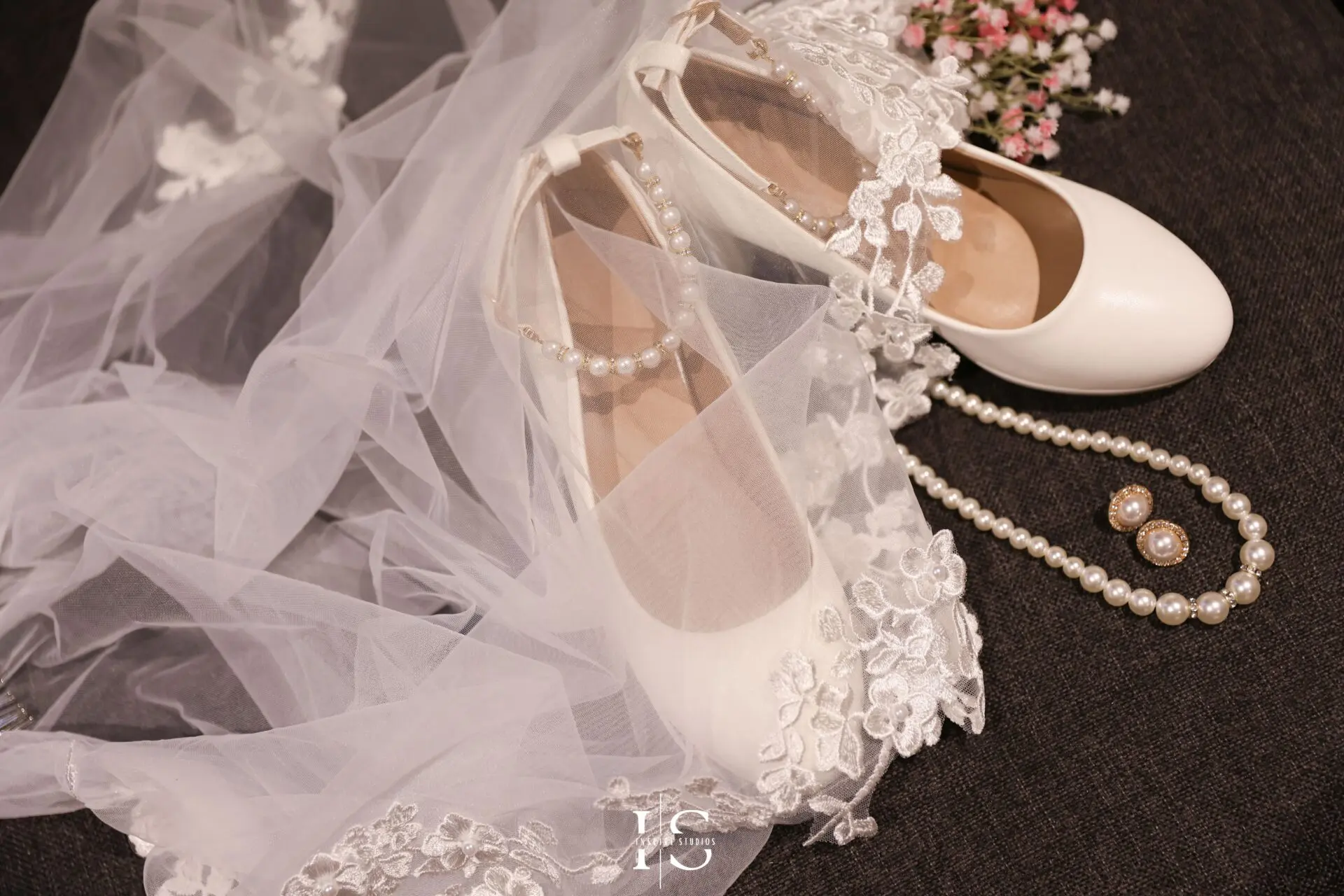 Close-up details of a Filipino bride’s wedding dress during her registry wedding at Danson House in Bexley.