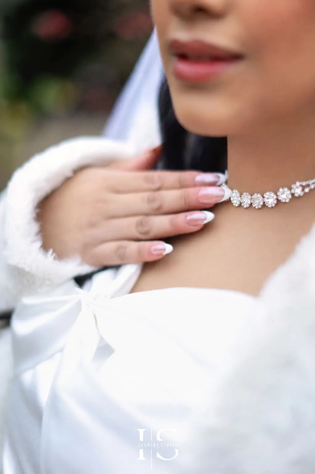 Filipino bride and groom having their wedding portraits photographed outdoors in Danson Park, Bexley.