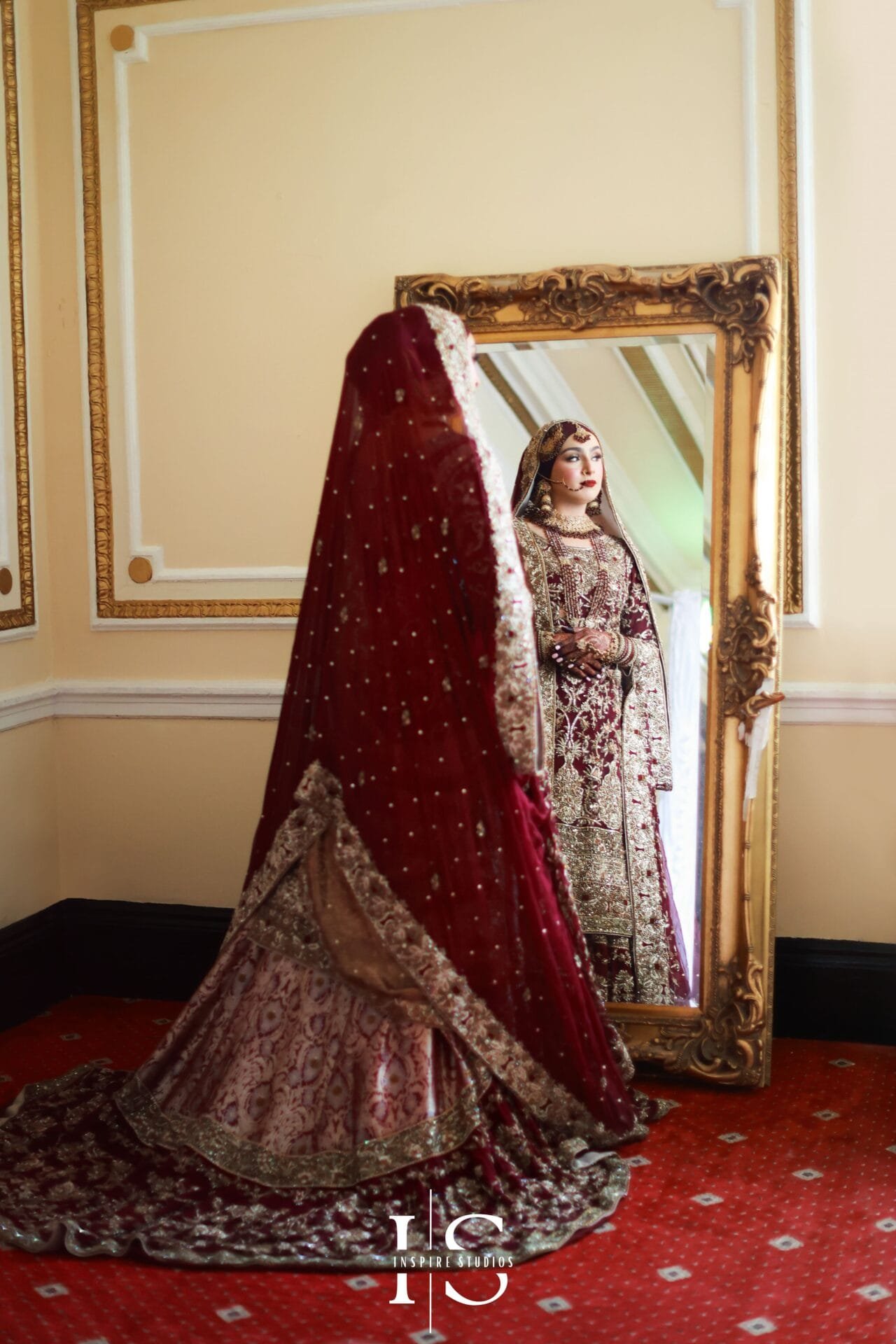 Bride posing for bridal portraits at Royal Regency London during her luxury wedding celebration.