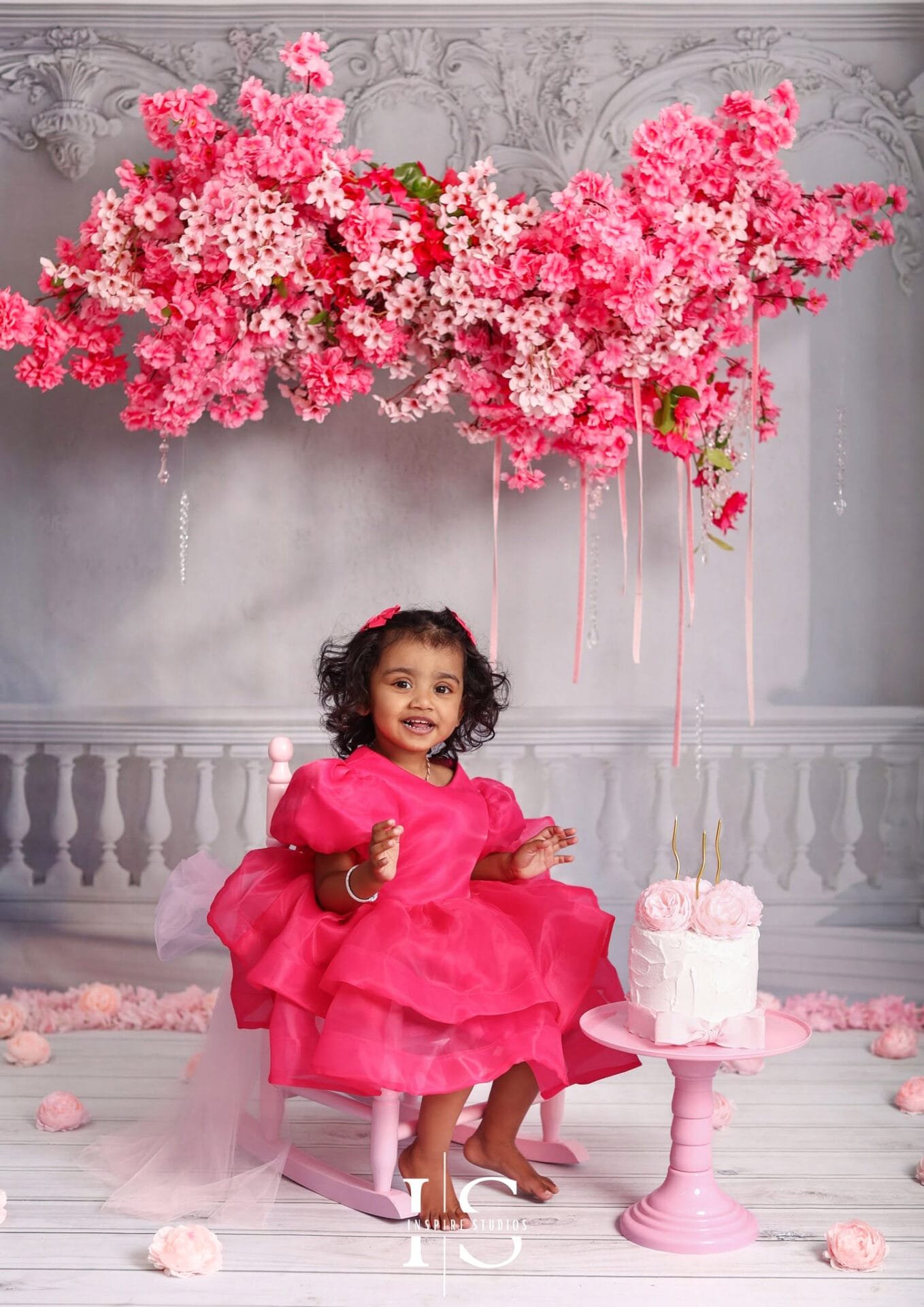 White cherry blossom backdrop for kids birthday photoshoots at a photography studio in Walthamstow, East London.