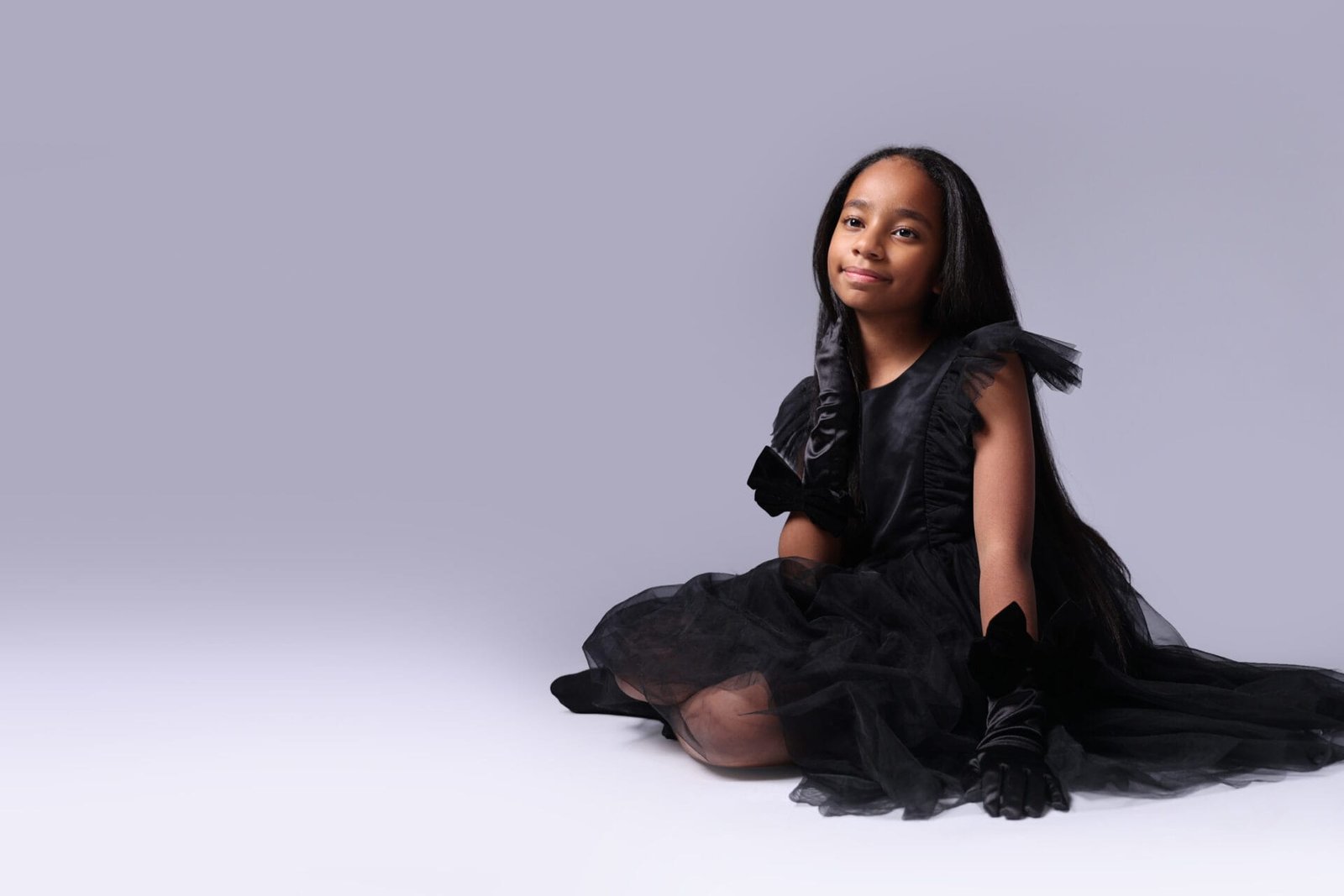 Child posing for a modelling portfolio portrait at Inspire Studios in Walthamstow, East London.