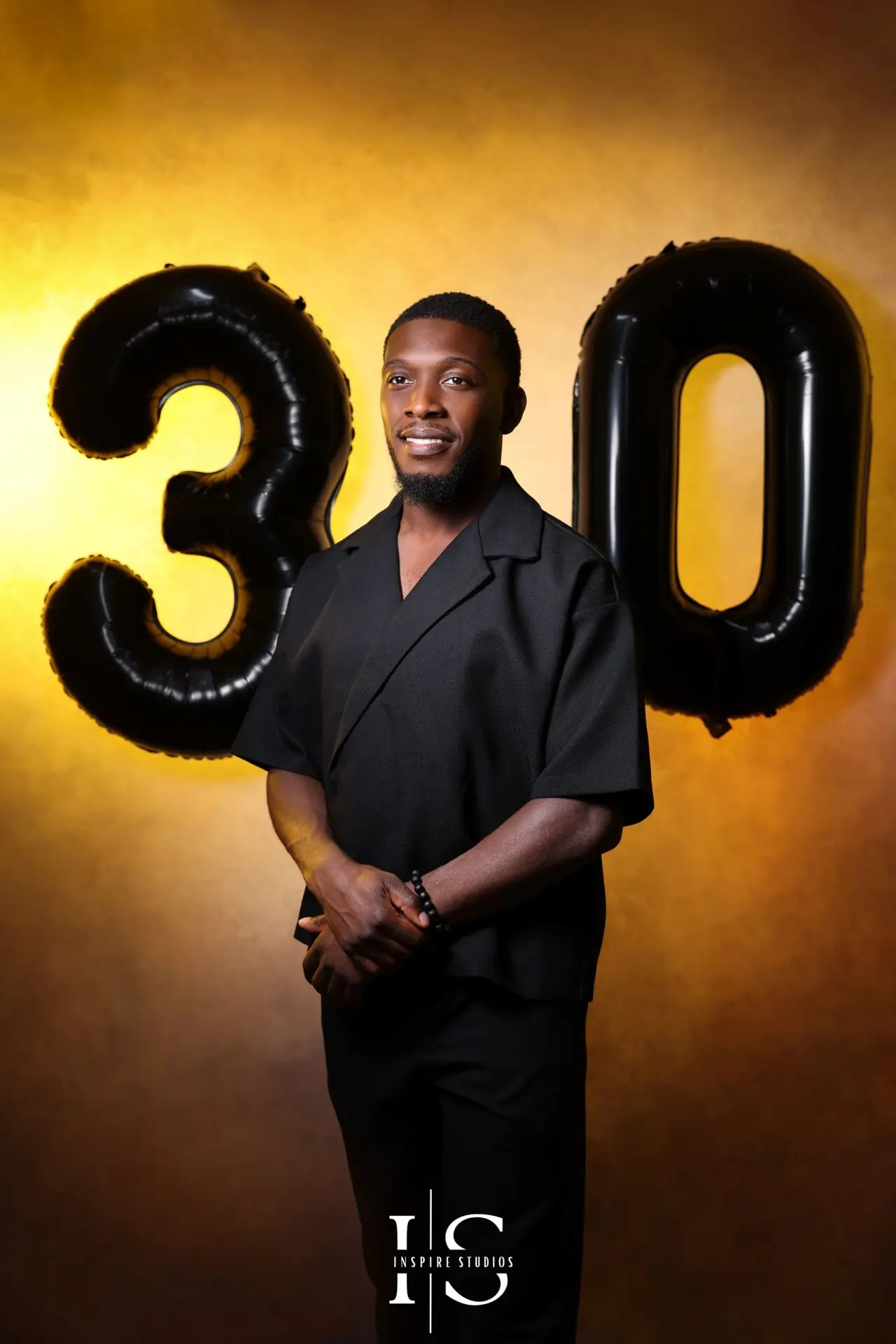 Professional studio birthday portrait of a man celebrating his 30th birthday in London.