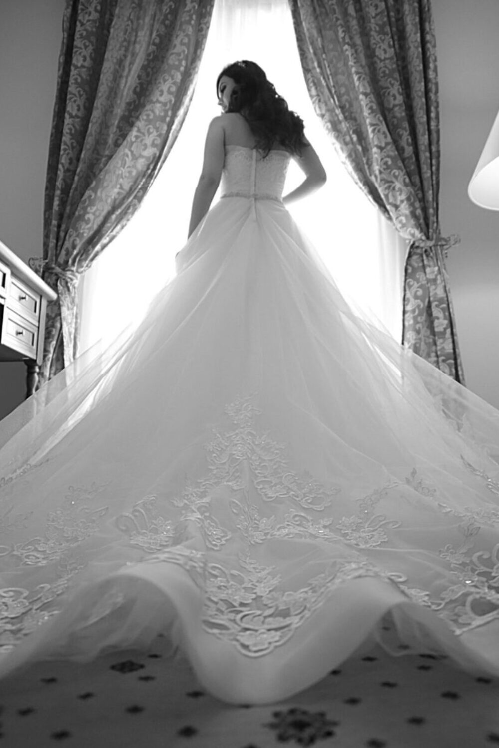 Wedding photographer in London capturing bride in white wedding dress.